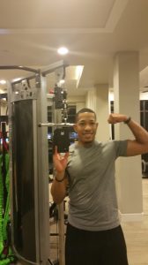 bryan lockley at the gym, flexing and taking a selfie 